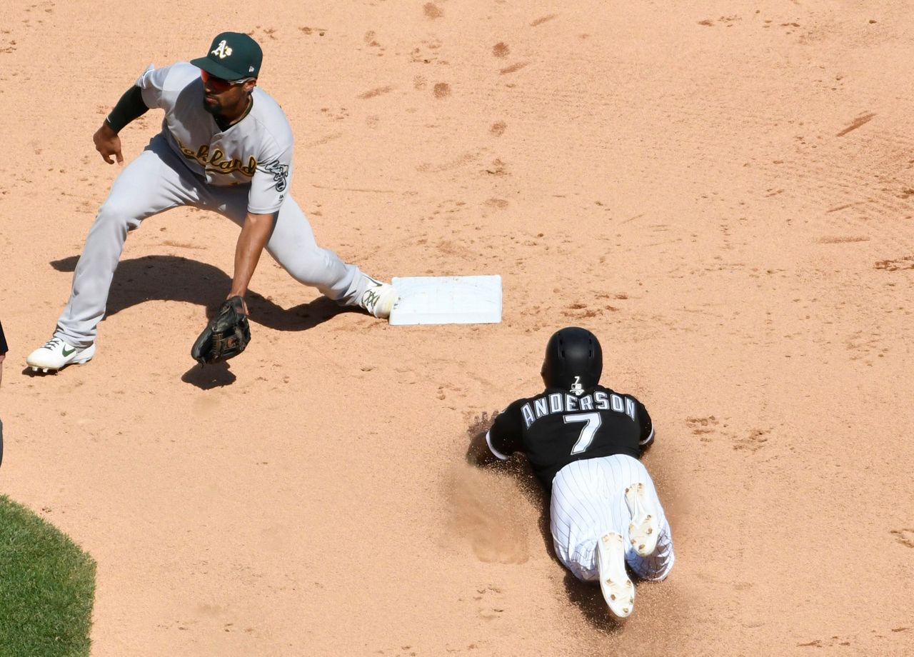 Fiers keeps rolling, A's hit 3 HRs to rip White Sox 7-0