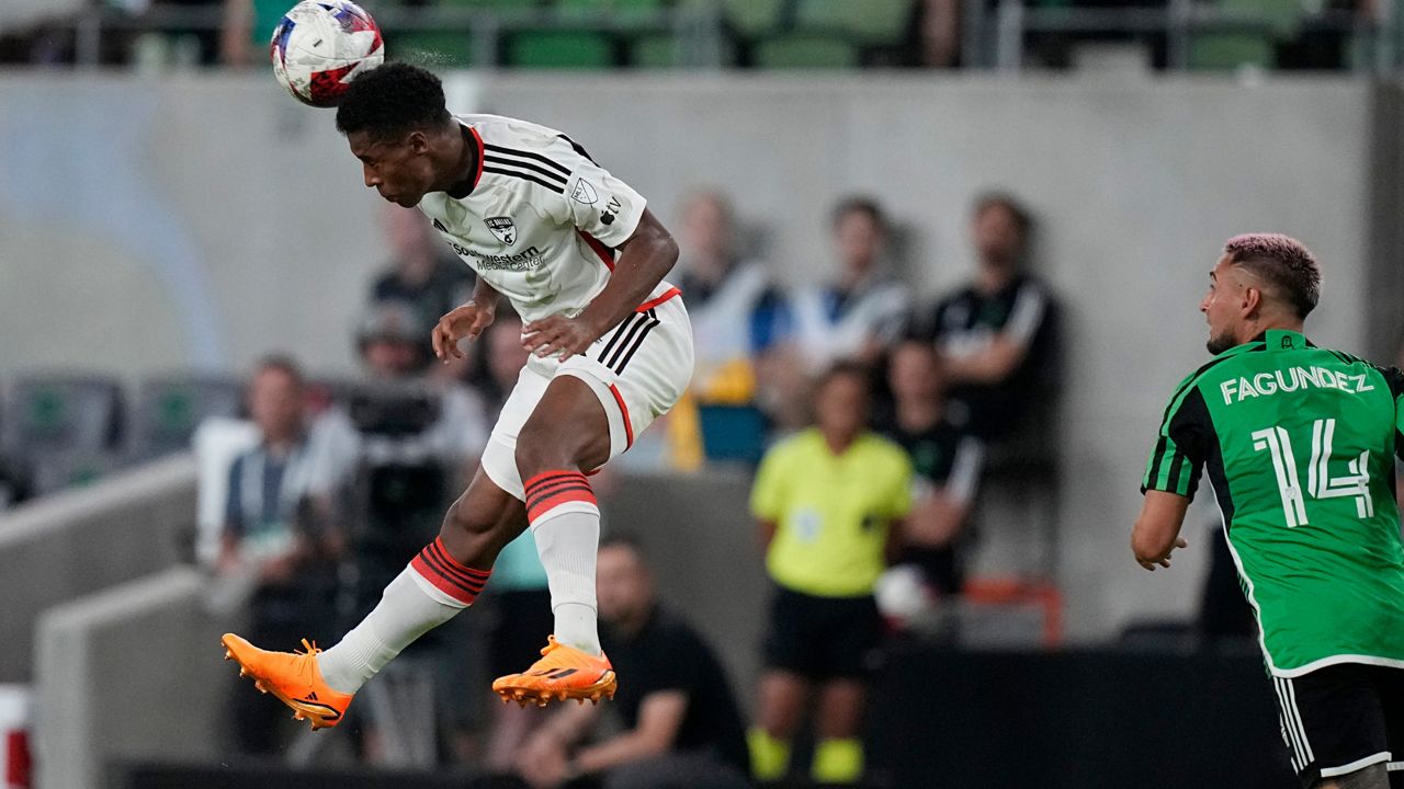 FC Dallas defender Geovane Jesus, left, heads the ball in front of Austin FC forward Diego Fagundez (14) during the second half of an MLS soccer match in Austin, Texas, Wednesday, June 21, 2023. (AP Photo/Eric Gay)