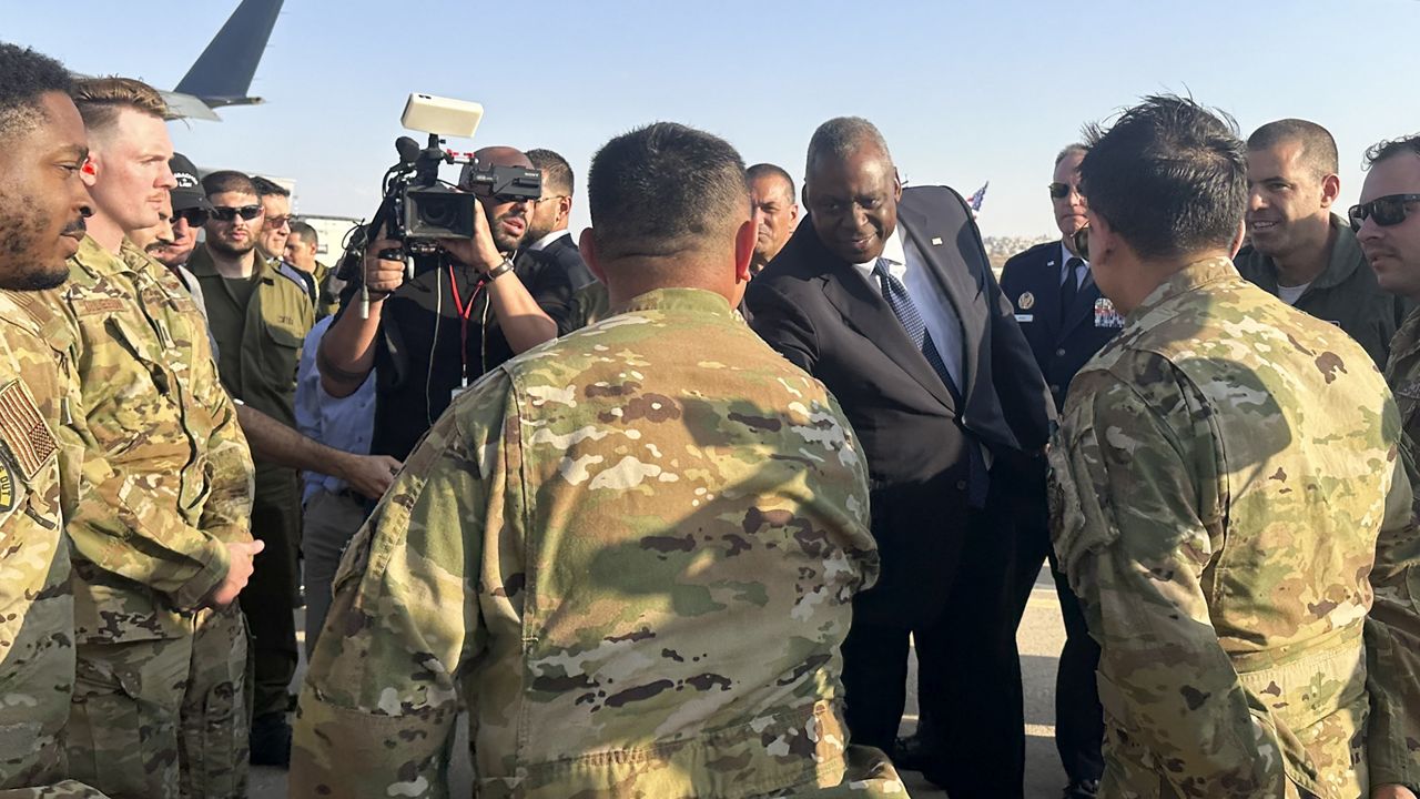 U.S. Defense Secretary Lloyd Austin thanks crew members at the Nevatim Air Base in the desert in Israel, Friday, Oct. 13, 2023. (AP Photos/Lolita Baldor)