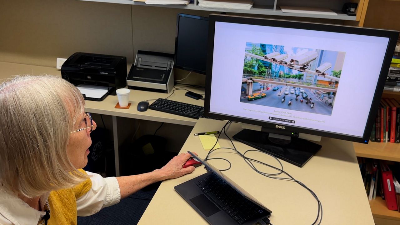 University of Texas at Austin journalism professor Sharon Strover is one of many working with test groups on the use of AI in major cities, specifically drones and cameras. (Spectrum News/Dylan Scott)