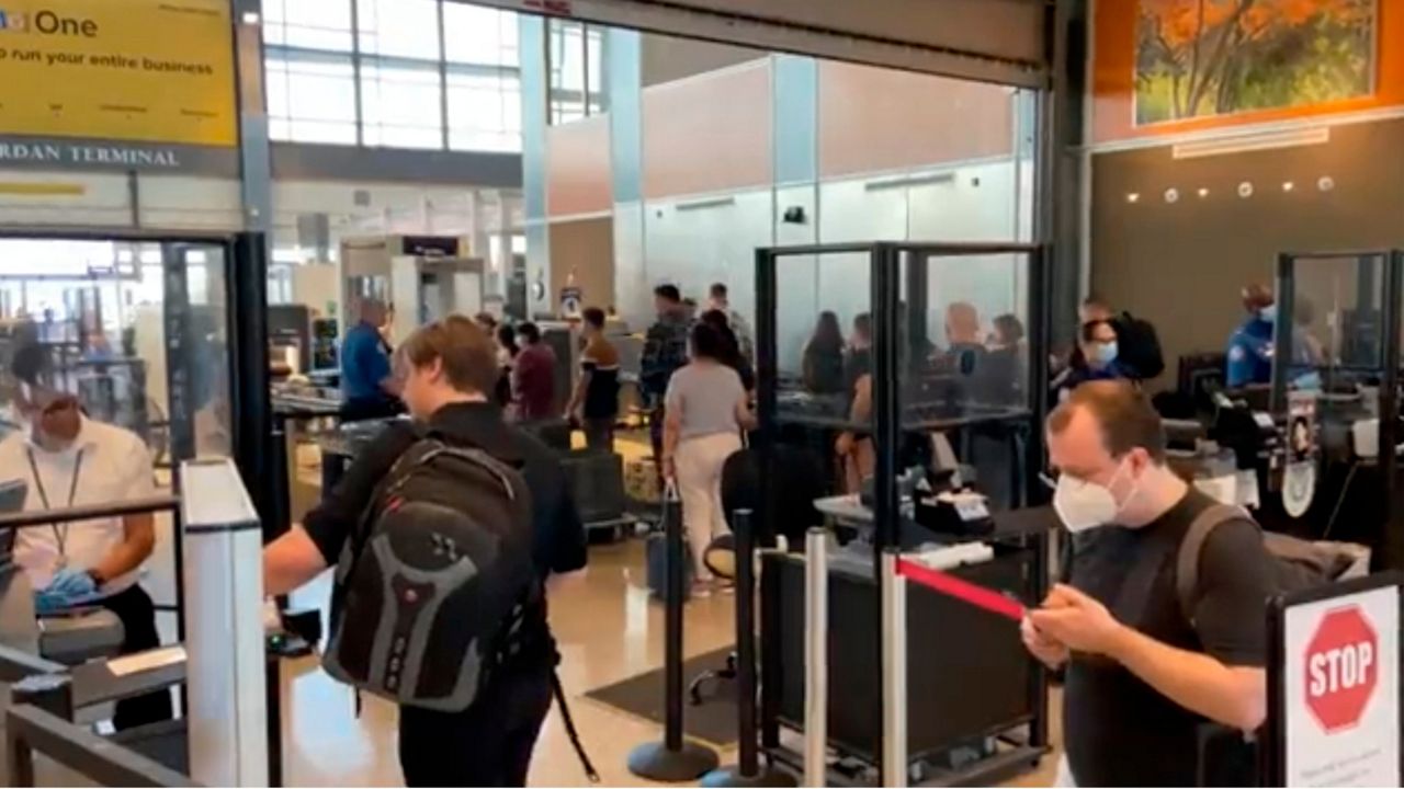 Travelers line up at a TSA screening area at Austin-Bergstrom International Airport in Austin, Texas. (Spectrum News 1)