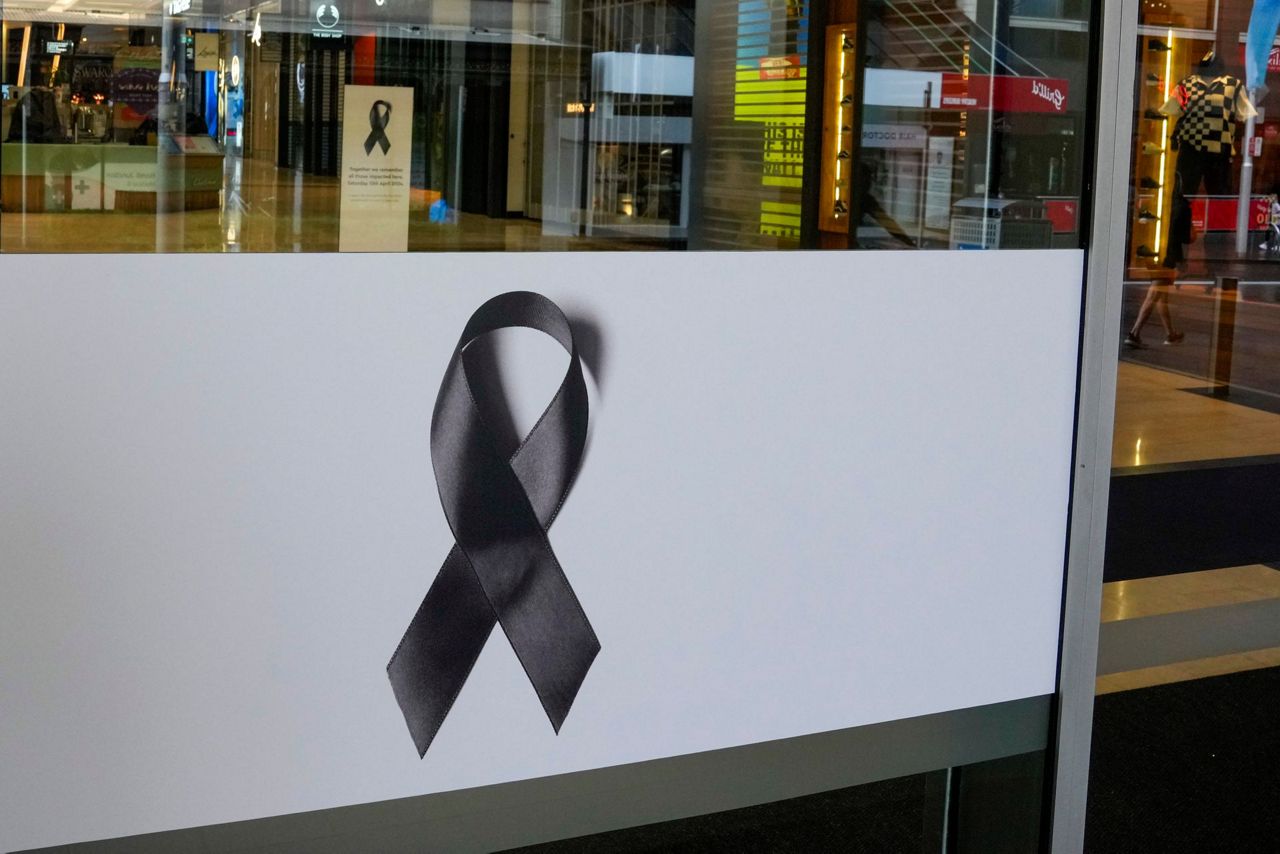 Sydney shopping mall reopens after stabbings. Police make first arrest ...