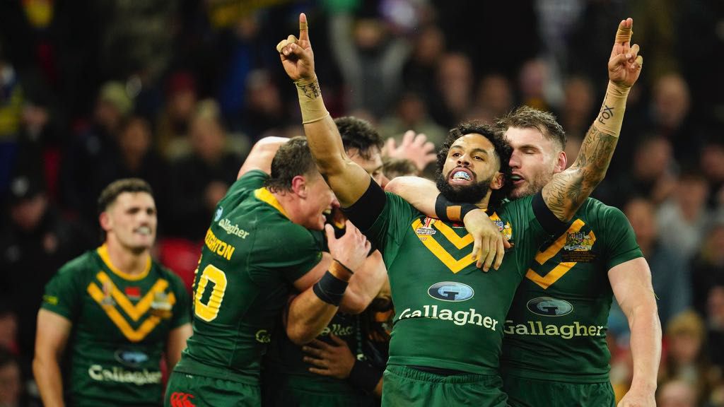 Australia's Josh Addo-Carr celebrates at the end of the Rugby League World Cup final match between Australia and Samoa at the Old Trafford Stadium in Manchester, England, Saturday, Nov. 19, 2022. (AP Photo/Jon Super, File)