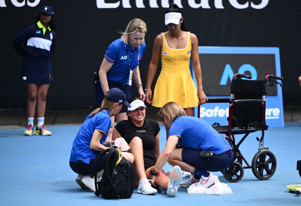 Canada's Stakusic leaves court in a wheelchair as Australian Open warms up