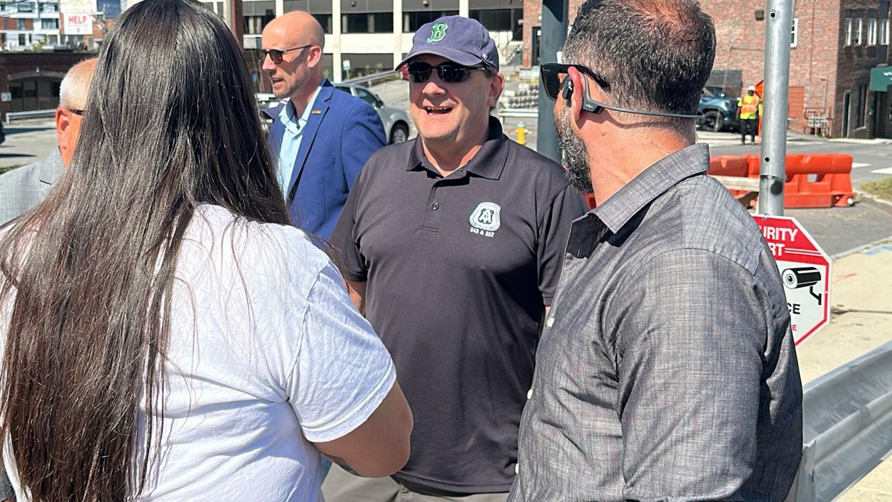 U.S. Senate hopeful Troy Jackson attends a ceremony for Avesta Housing’s latest housing project, a 201-unit building in Portland’s Bayside neighborhood Tuesday. (Spectrum News/Sean Murphy)