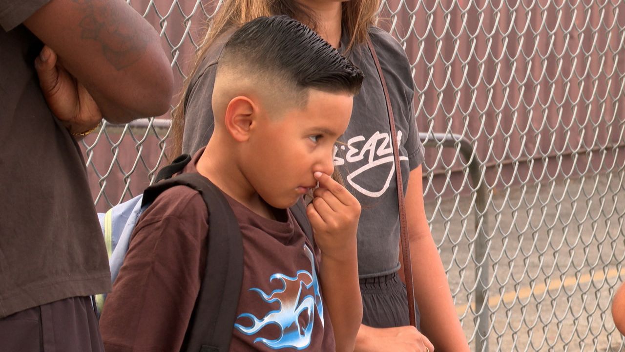 Kids head back to school as cleanup efforts continue at Boyle Heights warehouse