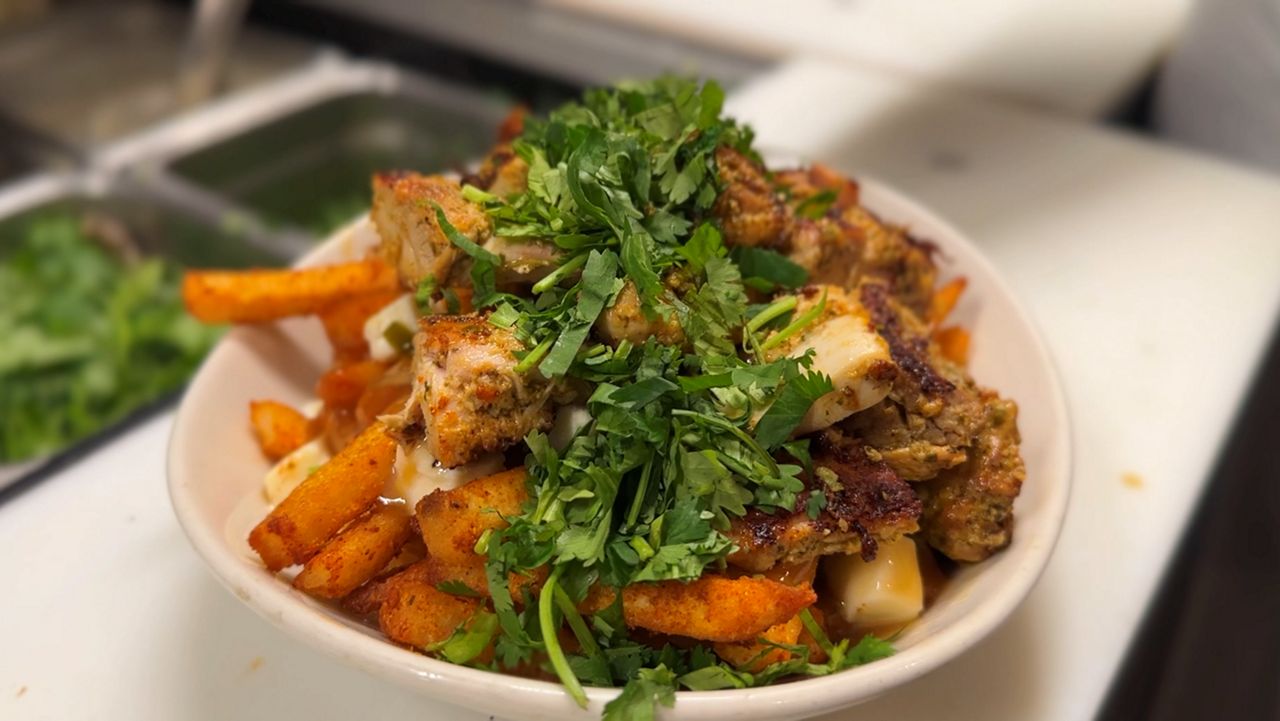 Chicken tikka poutine from Badmaash. (Spectrum News/Jada Montemarano)