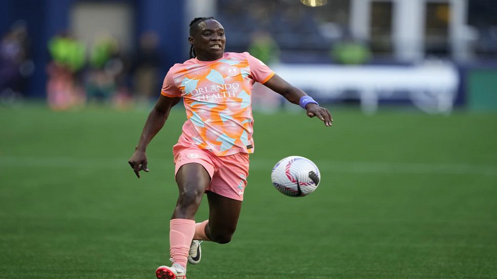 Orlando Pride forward Barbra Banda runs with the ball against the Seattle Reign during an NWSL soccer match, Sunday, May 19, 2024, in Seattle. Orlando won 3-2. (AP Photo/Lindsey Wasson)