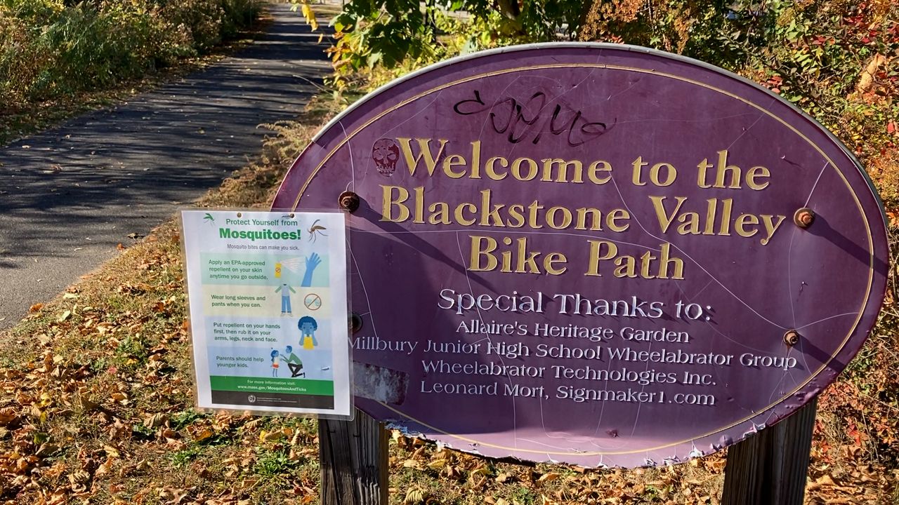 The entrance of the Blackstone Valley Bike Path, where police responding to a brush fire found one person dead in an encampment.