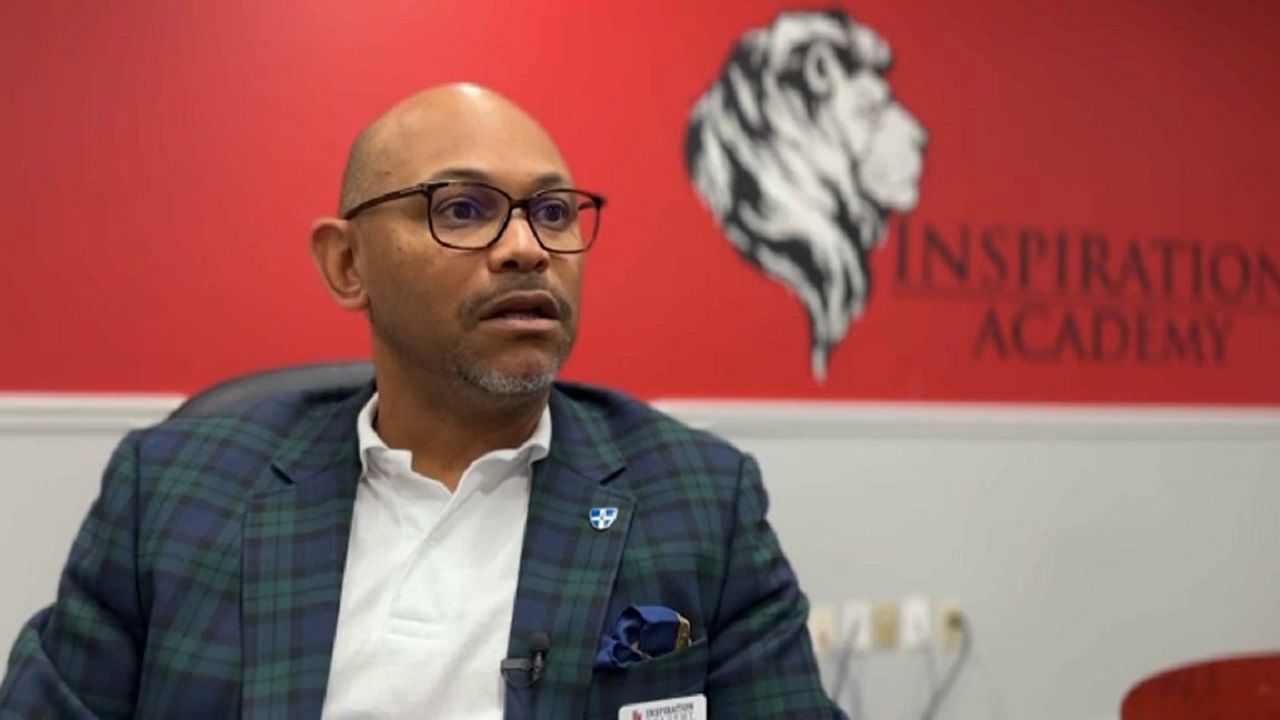 Dr. Francis Tobienne, Jr. teaches tenth through twelfth-graders various literature classes. (Spectrum News)