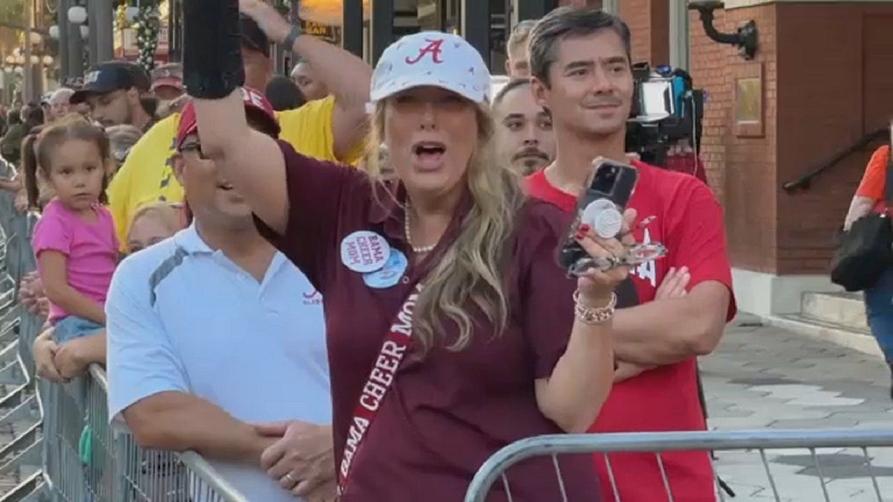 Alabama fans enjoy the ReliaQuest Bowl parade Monday in Ybor City. (Spectrum News image)