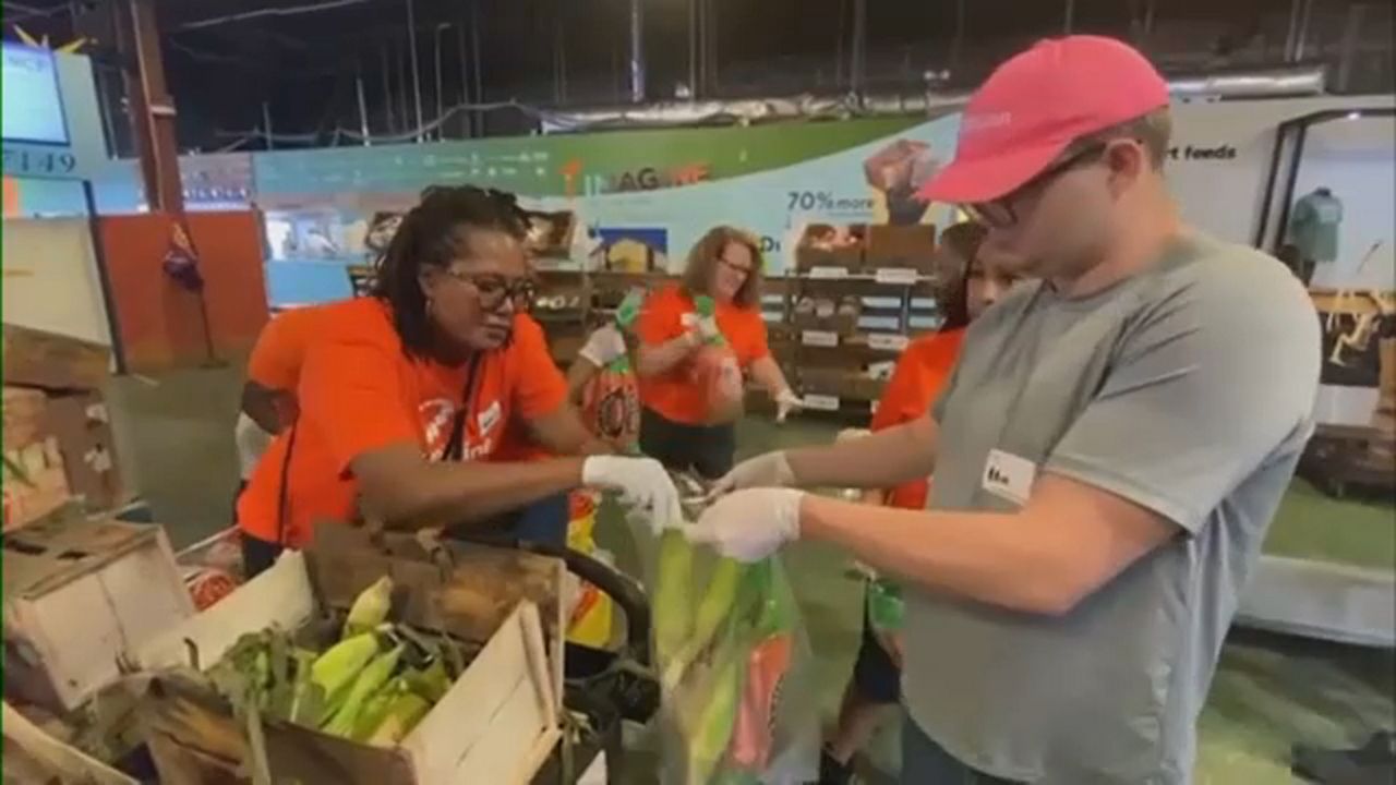 On a typically busy day at Feeding Tampa Bay, President and CEO Thomas Mantz, as well as staff and thousands of volunteers are busy doing the work that helps provide meals for some one million people annually across a 10-county area. (Spectrum News image)
