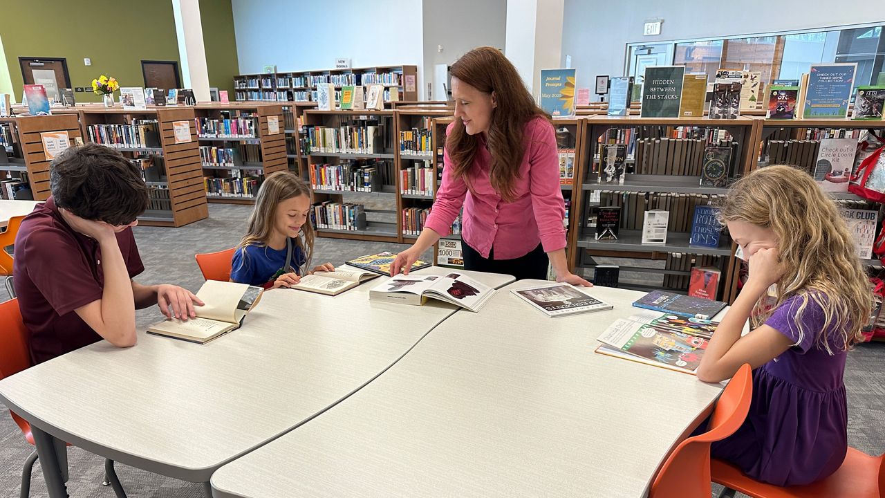 Pasco homeschool parent Angela Sarabia speaks with students. (Spectrum Bay News 9/Fallon Silcox)