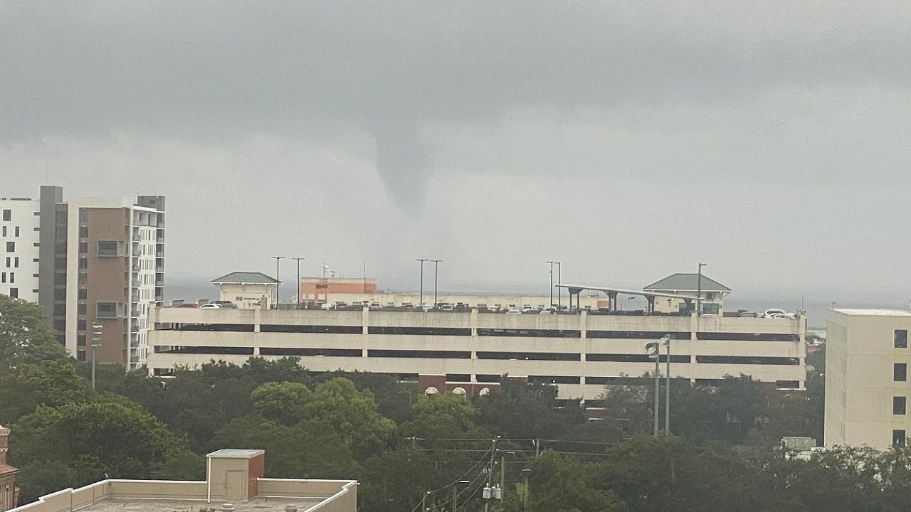 A waterspout is spotted in St. Petersburg, Fla. before pushing onshore.