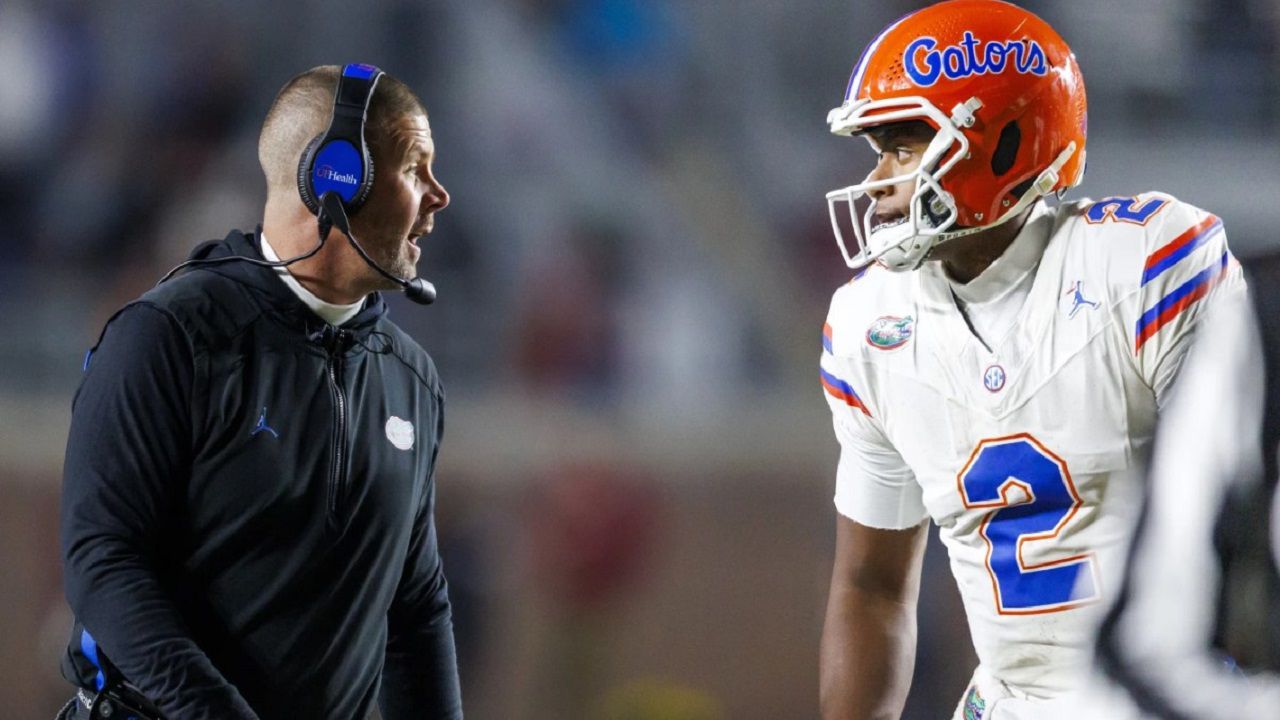 University of Florida coach Billy Napier (left) and quarterback DJ Lagway during action this season. Both will lead the Gators in the Gasparilla Bowl Friday at Raymond James Stadium. (AP Photo)