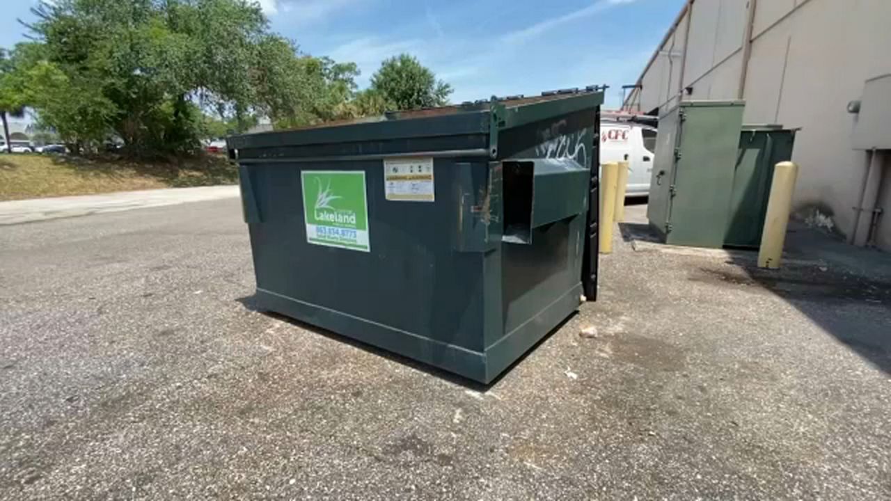 The baby boy's body was found in a dumpster behind businesses in the 3600 block of south Florida Avenue. (Spectrum News image)