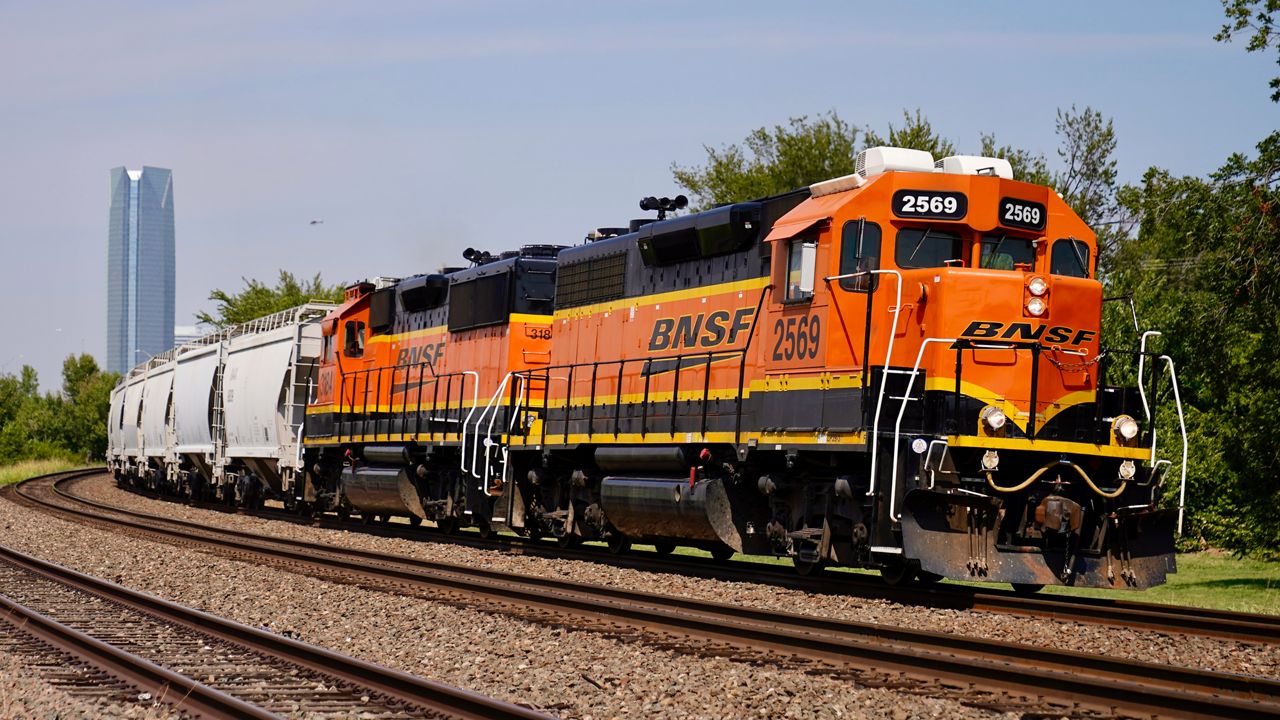 FILE - A BNSF locomotive heads south out of Oklahoma City, Sept. 14, 2022. (AP Photo/Sue Ogrocki, File)