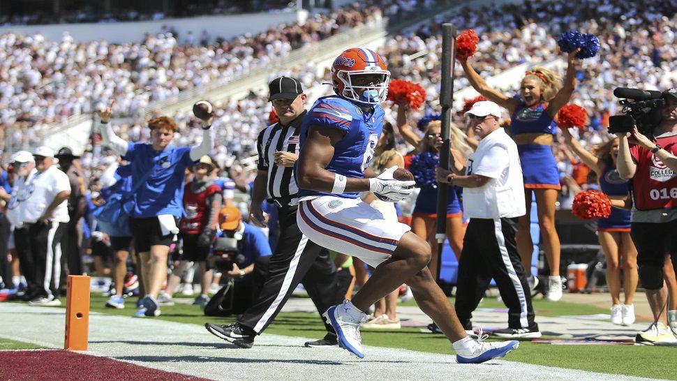 Florida tight end Arlis Boardingham (8) scores a touchdown against Mississippi State during the first half of an NCAA college football game in Starkville, Miss., Saturday, Sept. 21, 2024. (AP Photo/James Pugh)