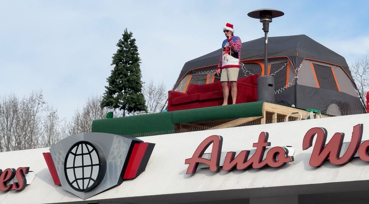 Car dealership owner living on roof to gather bikes for kids