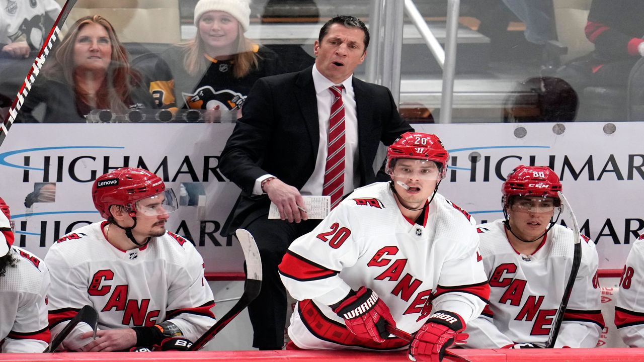 Carolina Hurricanes coach Rod Brind'Amour stands behind the bench during a game against the Pittsburgh Penguins in Pittsburgh, Thursday, Dec. 21, 2023. (AP File Photo/Gene J. Puskar)