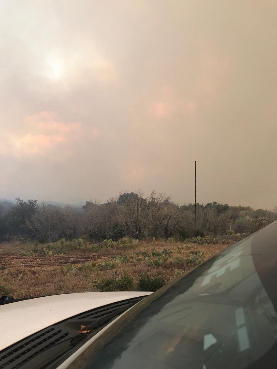 A hazy view of the fire from the distance