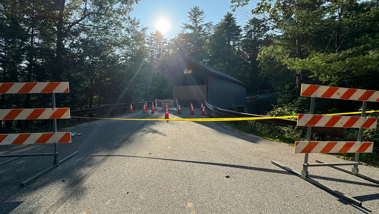 Photo In. Caption: The Babb's Bridge that connects Gorham and Windham is now closed to the public for several months. (Spectrum News/Matthew Jaroncyk)