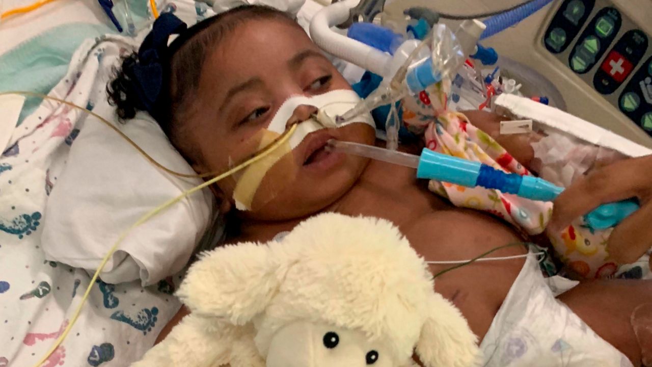 This photo provided by Texas Right to Life shows Tinslee Lewis on Nov. 8, 2019. Lewis, now 3 years old, has improved enough that she was released from the hospital on April 7, 2022, and will now be cared for at home. The girl's mother had waged a court battle to keep doctors from removing her from life support. (Texas Right to Life via AP, File)