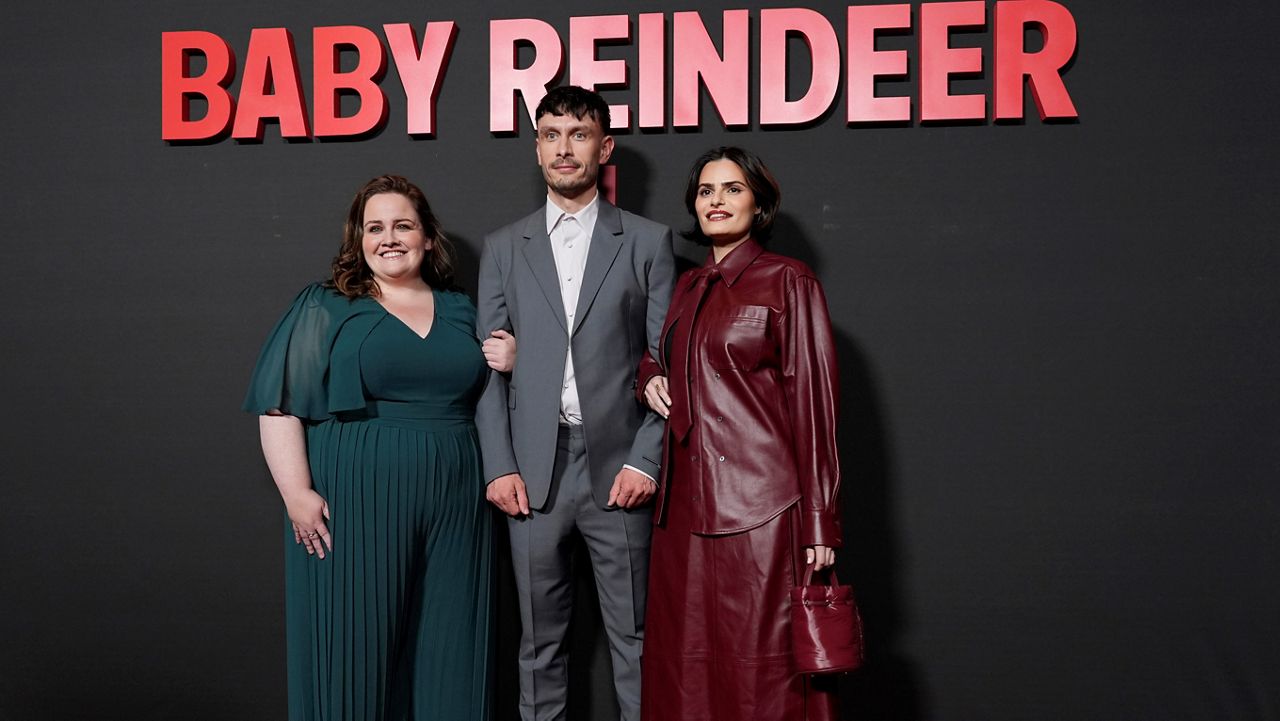 Richard Gadd, center, the creator and star of "Baby Reindeer," poses with cast members Jessica Gunning, left, and Nava Mau at a photo call for the Netflix miniseries at the Directors Guild of America, Tuesday, May 7, 2024, in Los Angeles. (AP Photo/Chris Pizzello)