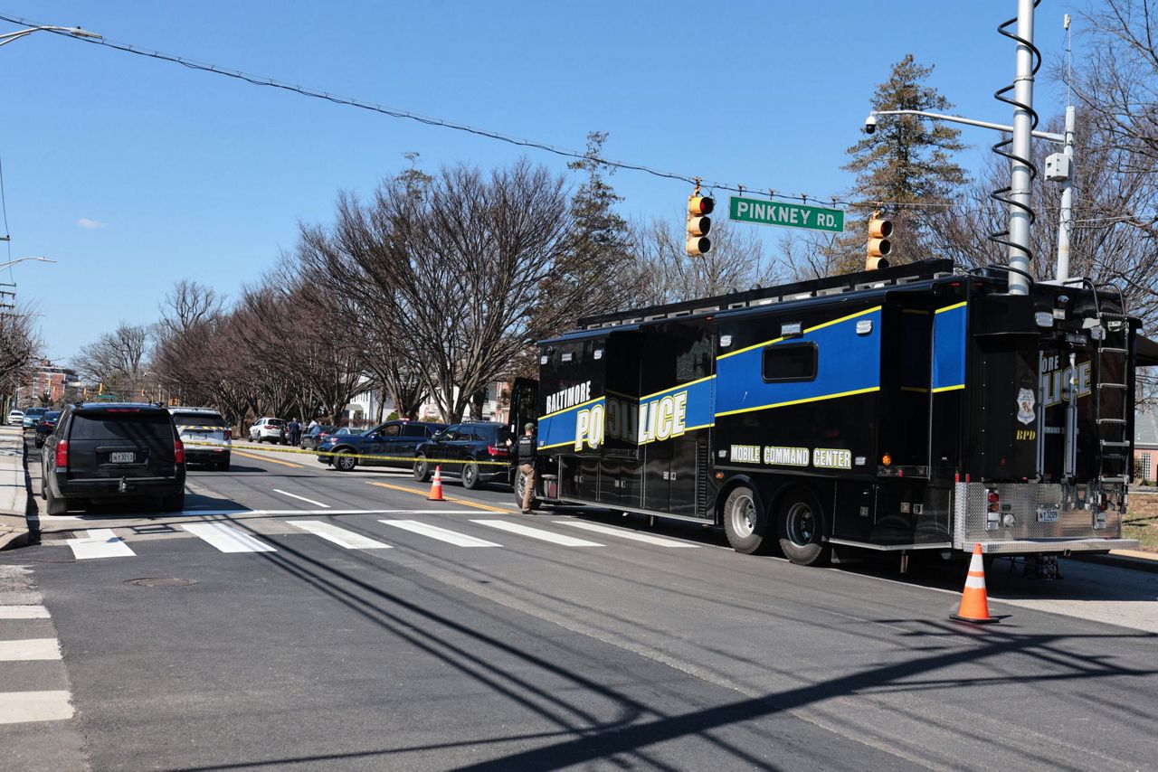 Baltimore police say an officer and suspect have been shot in an ...