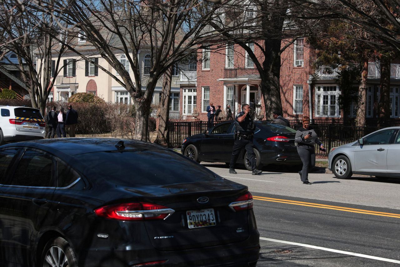 Baltimore police say an officer and suspect have been shot in an ...