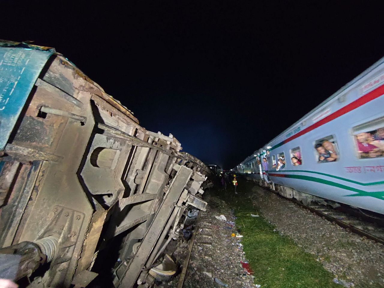 At least 12 killed and many injured when one train hits another in ...