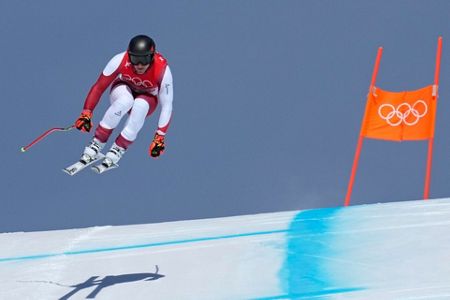 How Olympic ski jumpers toe the line between falling and flying