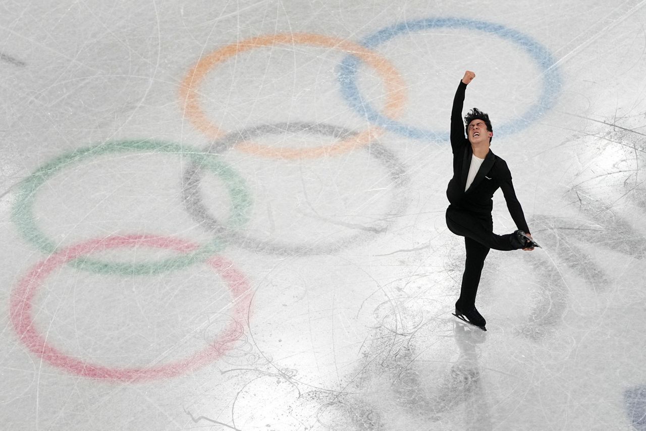 Chen delivers record short program to begin Olympic pursuit