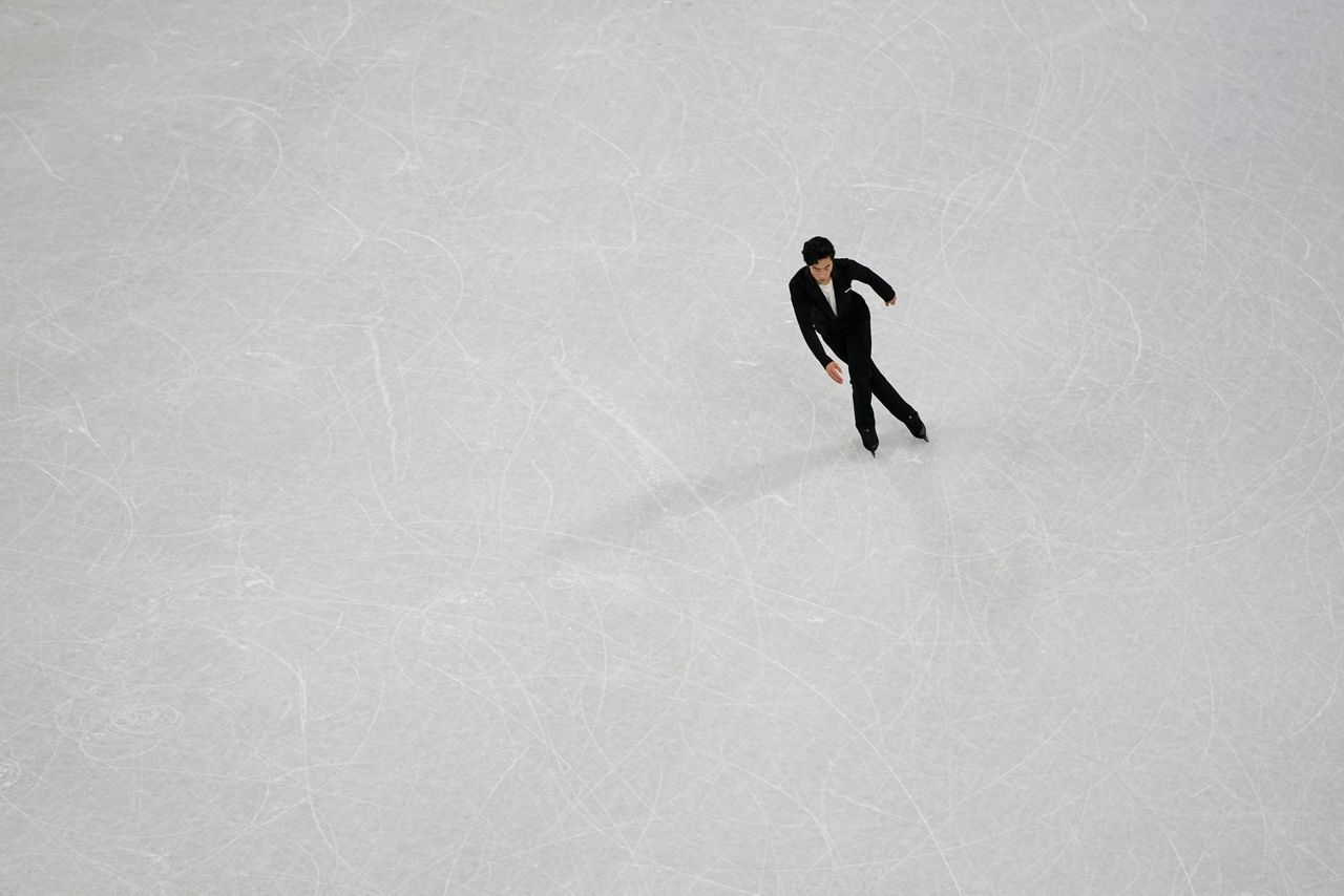 Chen delivers record short program to begin Olympic pursuit
