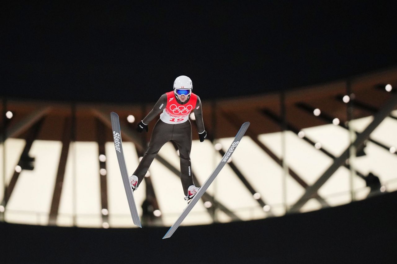 Slovenia wins Olympic debut of ski jumping mixed team