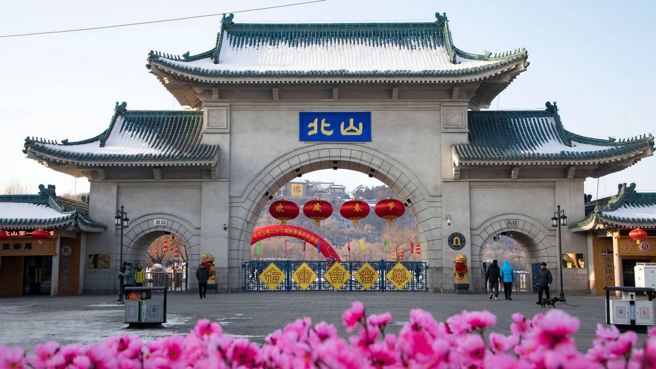 ourists walk past a gateway with the name "Beishan" seen at the Beishan Park in northeastern China's Jilin province on Jan 23, 2020. Four instructors from Iowa's Cornell College teaching at Beihua University in northeastern China were attacked in the Beishan public park, reportedly with a knife, officials at the U.S. school and the State Department said Tuesday, June 11, 2024. (Zhu Wanchang/CNS Photos via AP)