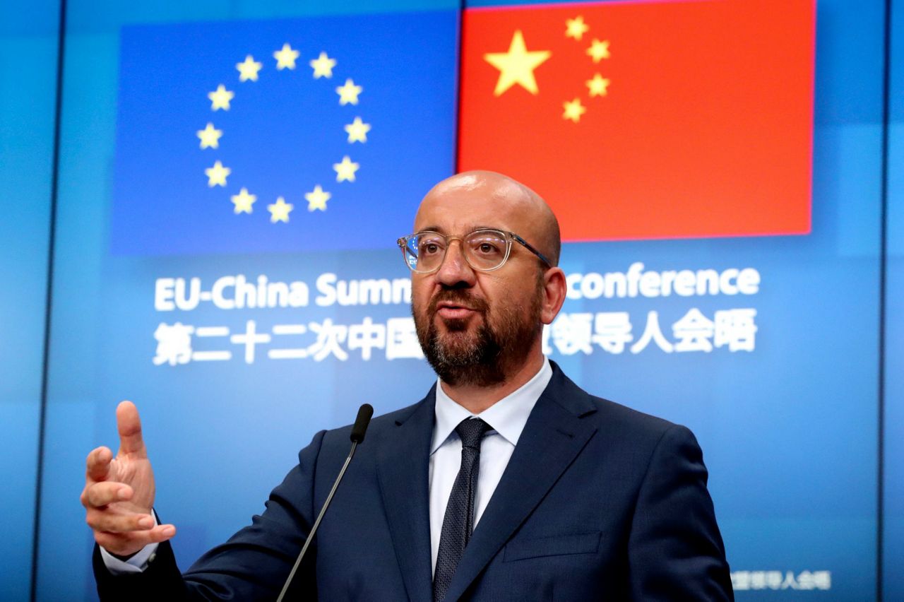 EU, China look to ease tensions, push on with business