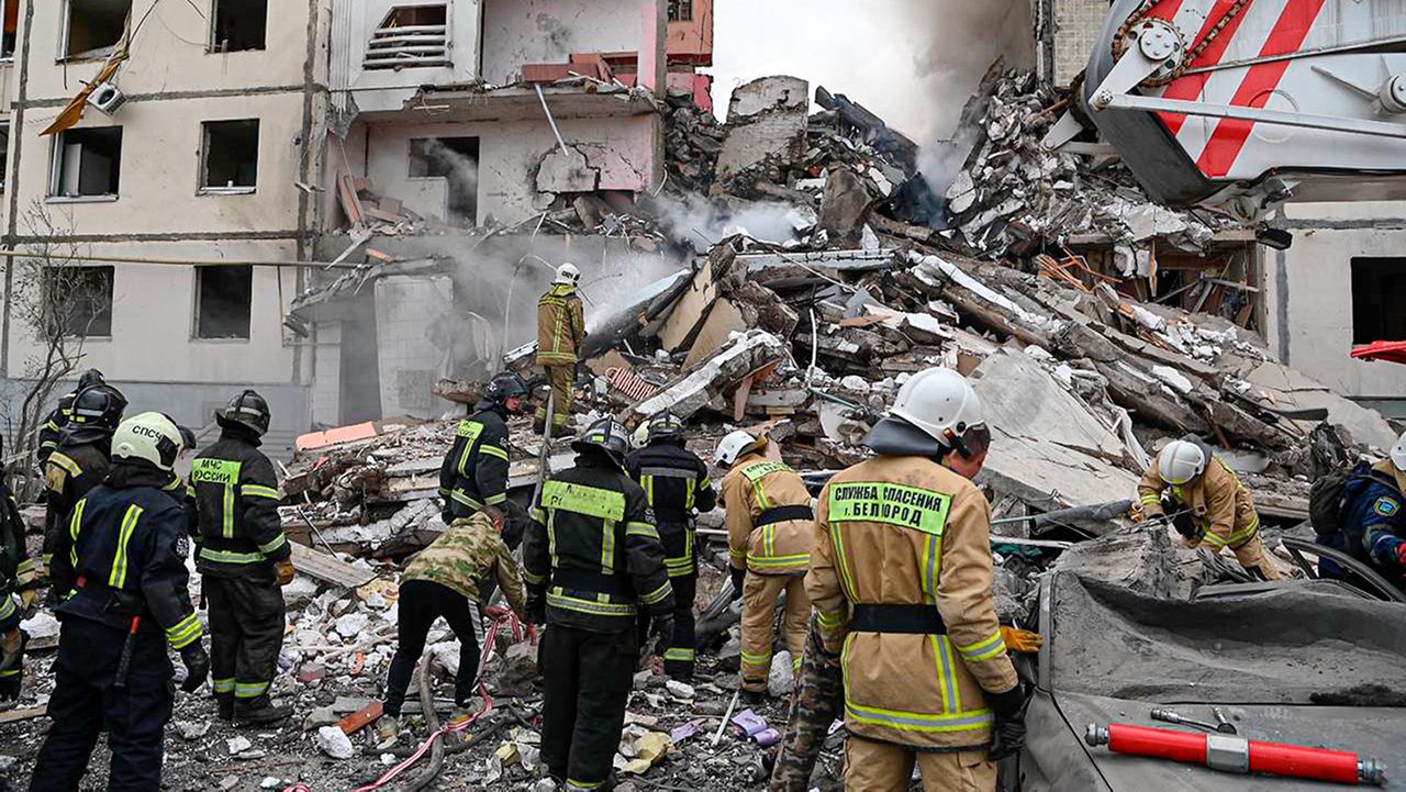 This photo released by Belgorod regional governor Vyacheslav Gladkov's Telegram channel on Sunday, May 12, 2024, Russian emergency service employees work at the scene of a partially collapsed block of flats after a missile attack by the Ukrainian Armed Forces in the Russian city of Belgorod, Russia. In a statement, Russia's Investigative Committee, the country's top law enforcement agency, said that the 10-story block had been hit by Ukrainian shelling. (Belgorod Region Governor Vyacheslav Gladkov Telegram channel via AP)