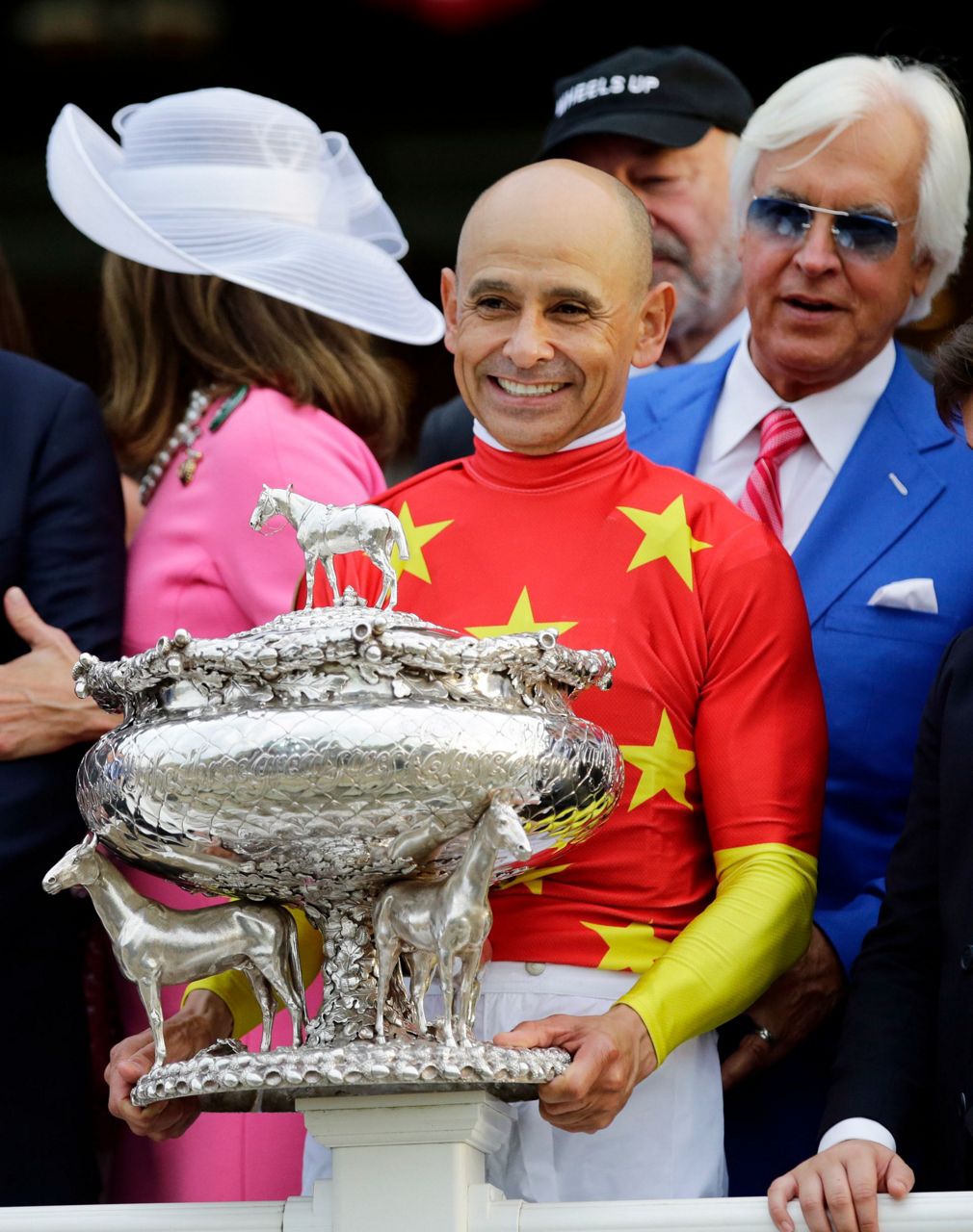 Mike Smith guides Justify to Triple Crown, oldest jockey