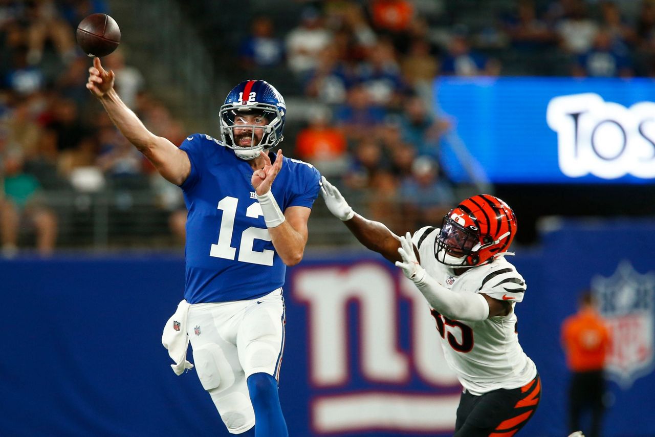 Cincinnati Bengals quarterback Brandon Allen (8) hands the ball