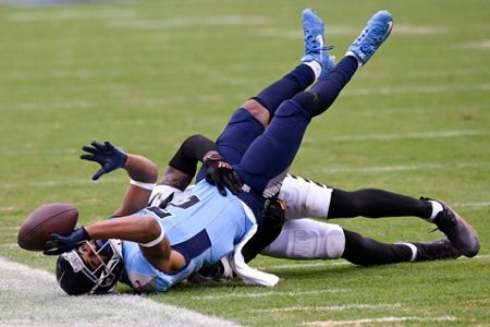 Joe Burrow's TD to Higgins lifts Bengals over Titans 20-16