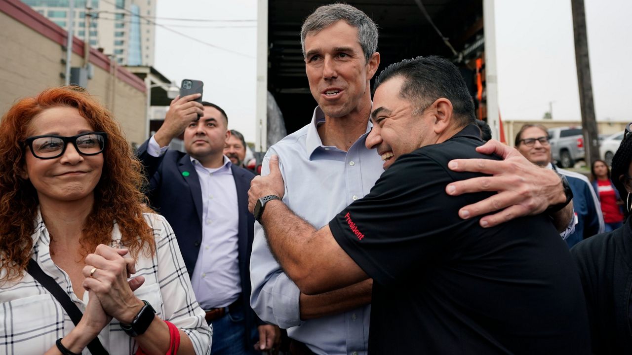 Democrat Beto O'Rourke, center, greets supporters during a campaign stop, Tuesday, Nov. 16, 2021, in San Antonio. O'Rourke announce Monday that he will run for Texas governor. (AP Photo/Eric Gay)