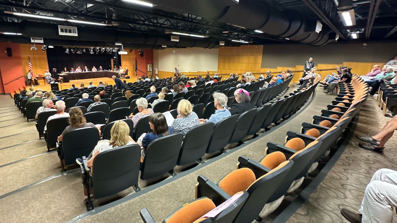 Residents gathered at the Little Theater at Biddeford High School for the first meeting of the Biddeford City Council since the fatal shooting of a local resident by an ICE agent last week. (Spectrum News/Sean Murphy)