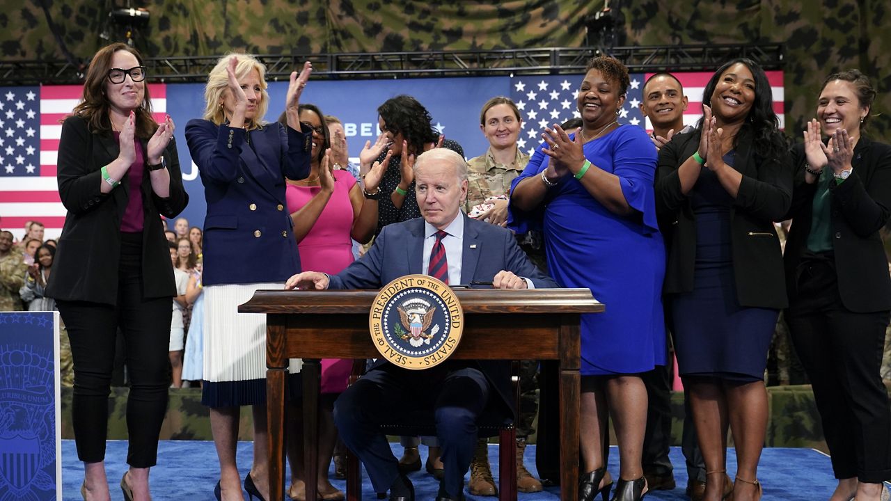 Biden signs order in Fort Liberty