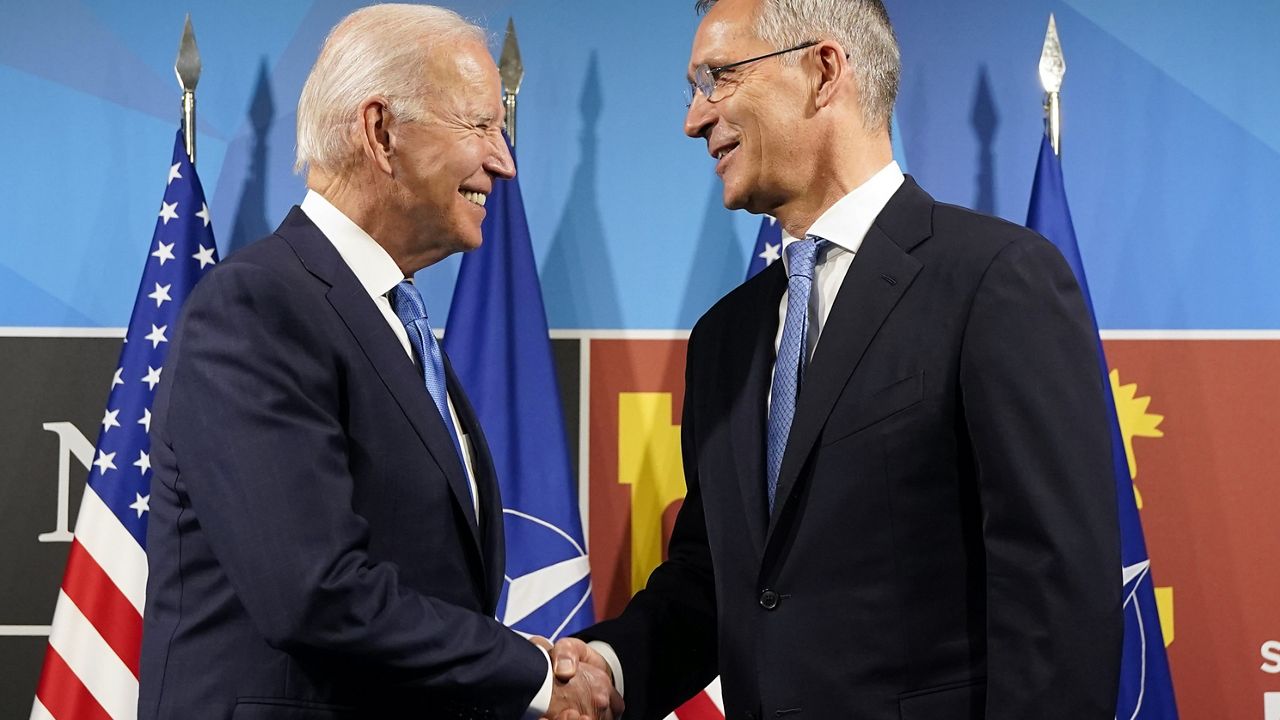 President Joe Biden, left, is greeted by NATO Secretary General Jens Stoltenberg during arrivals for a NATO summit in Madrid, Spain on Wednesday, June 29, 2022. (AP Photo/Susan Walsh)
