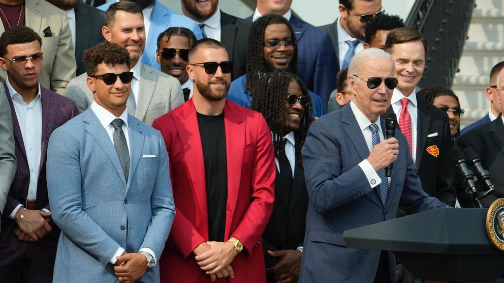 President Joe Biden speaks as Kansas City Chiefs quarterback Patrick Mahomes and Kansas City Chiefs tight end Travis Kelce listen as Biden welcomes the football team to the White House in Washington, Monday, June 5, 2023, to celebrate their championship season and victory in Super Bowl LVII. (AP Photo/Manuel Balce Ceneta)