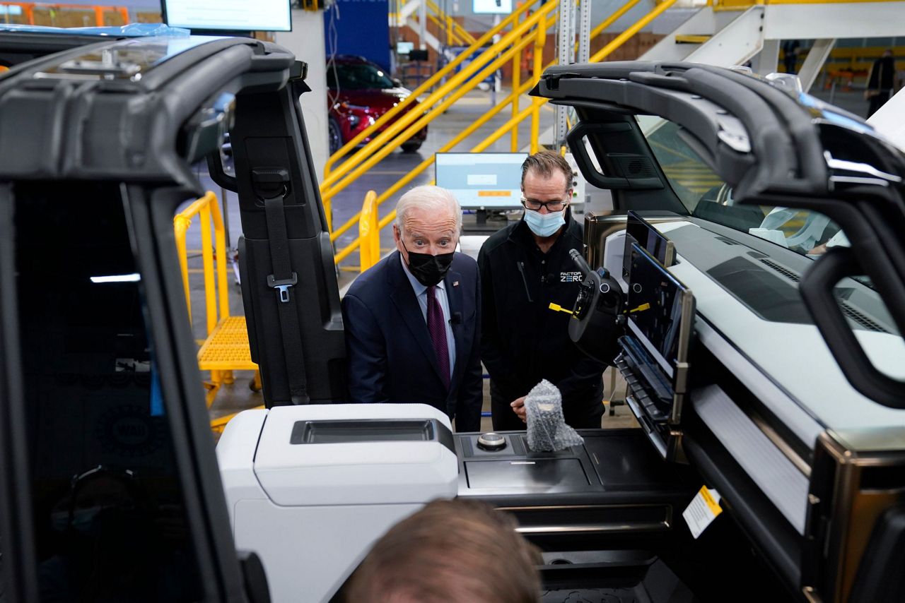 Biden pushes electric vehicle chargers as energy costs spike