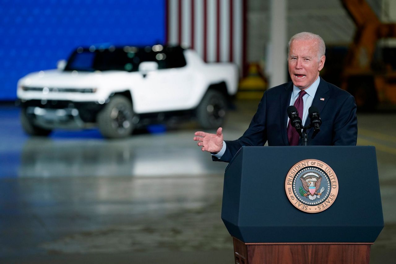 Biden pushes electric vehicle chargers as energy costs spike