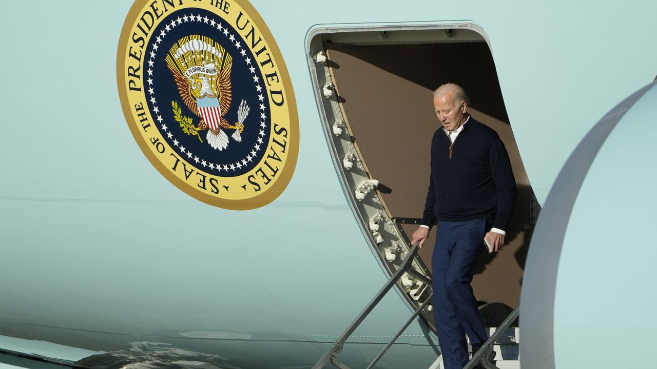 President Joe Biden walks down the steps of Air Force One at Andrews Air Force Base, Md., Monday, March 11, 2024, after returning from a trip to New Hampshire. (AP Photo/Susan Walsh)