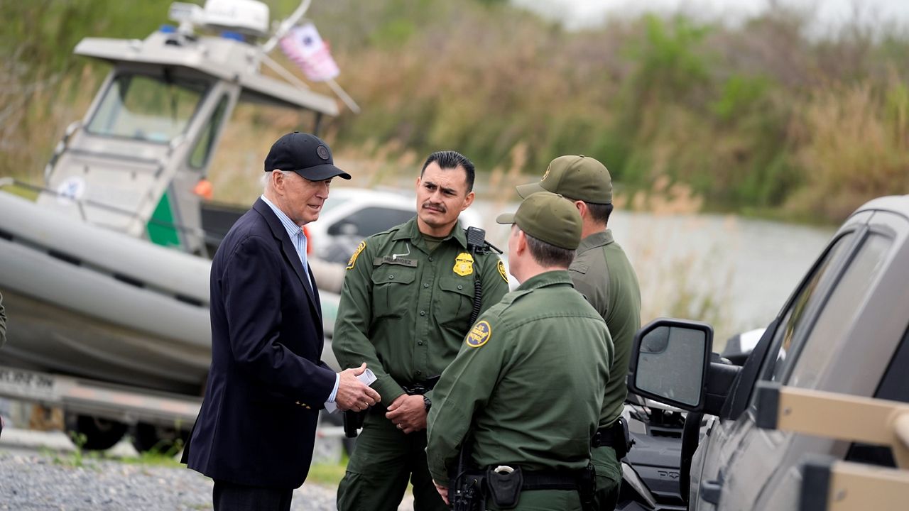 President Joe Biden talks with the U.S. Border Patrol, as he looks over the southern border, Thursday, Feb. 29, 2024, in Brownsville, Texas, along the Rio Grande. (AP Photo/Evan Vucci)